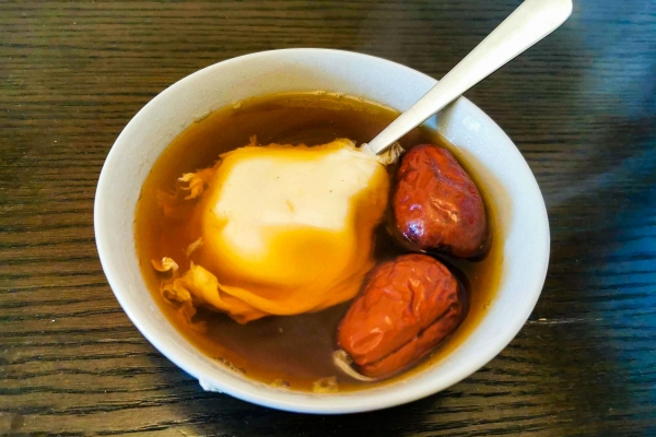 糯米酒煮鸡蛋功效